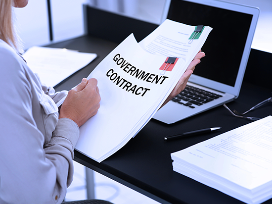 Image representing business alignment and cybersecurity requirements for government contract readiness or defense contract readiness.