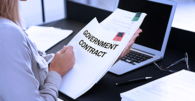 Government contract representing business alignment and cybersecurity requirements for government contract readiness and DPA implications.