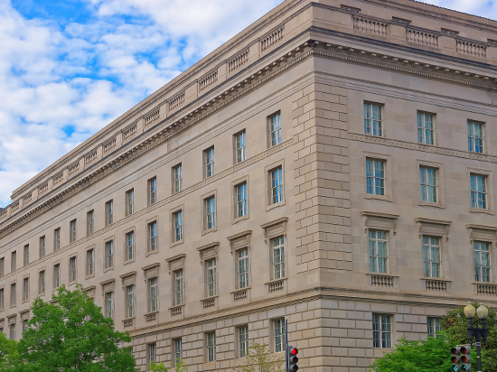 Federal building representing U.S. government cybersecurity operations and SOC management for multiple federal agencies.